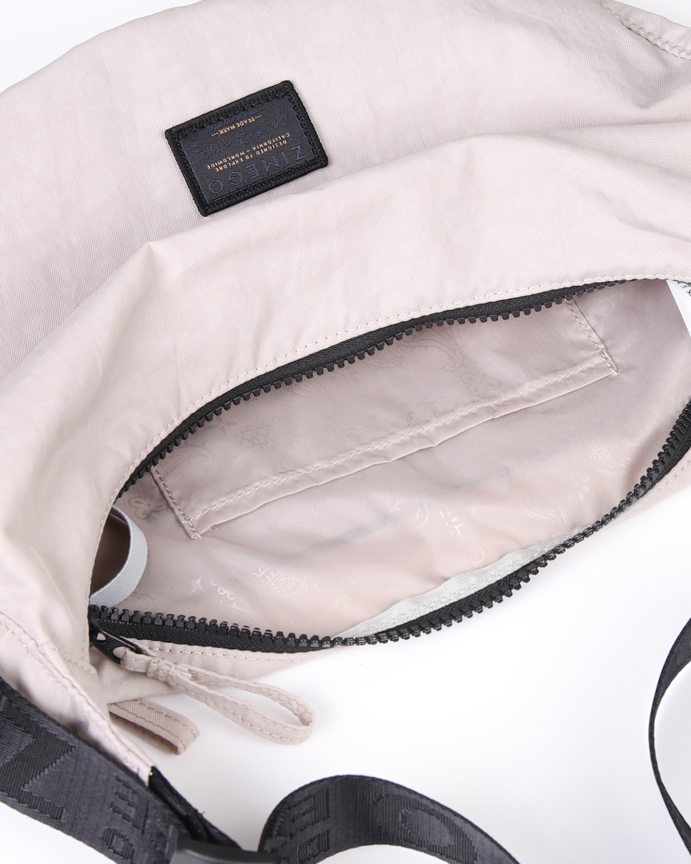 zimego crossbody crescent bag mushroom pink product detail view image